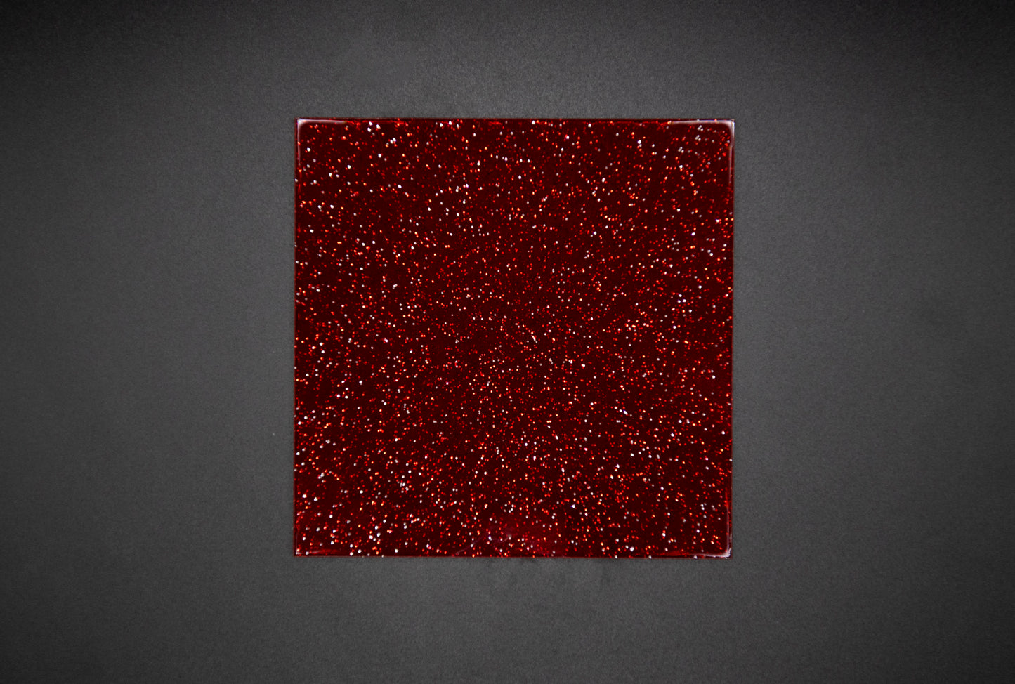 Glitter red jelly on black background