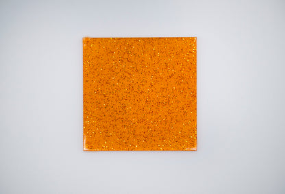 Glitter orange jelly on white background